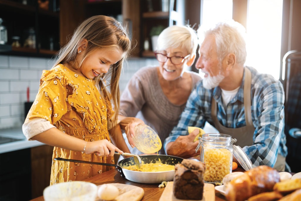 Grandparents playing with grandchildren